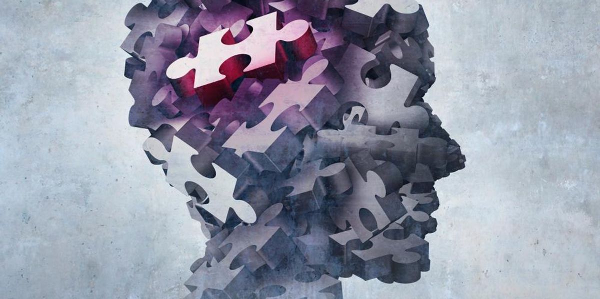 Puzzle-darabokból álló emberi fej - a személyiség koncepciója