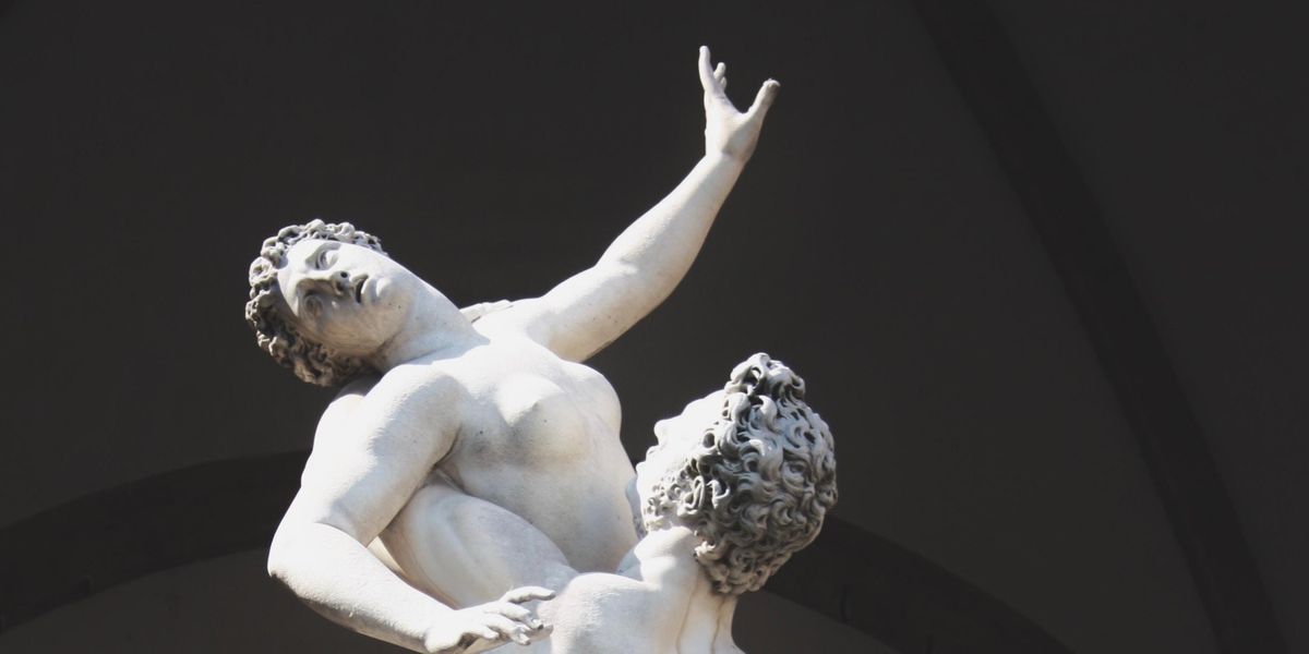 woman and men statue