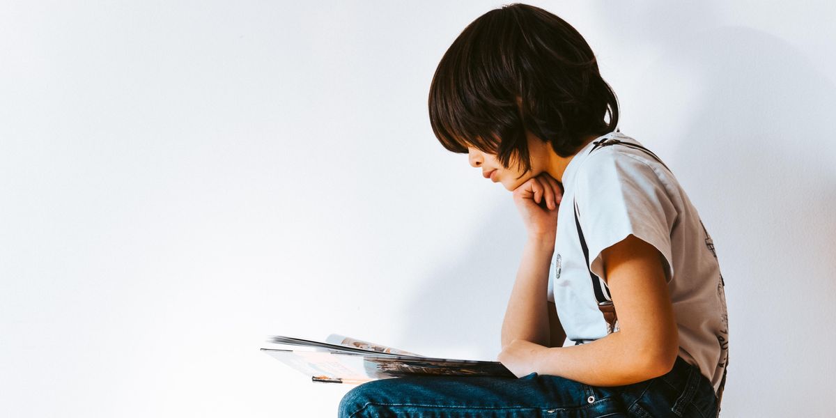 child reading a book