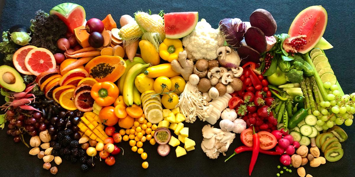 sliced fruits on black plate