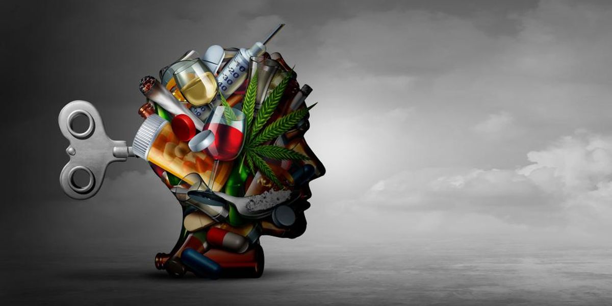 Emberi fej különböző, addikciót jelző dolgokkal: alkohol, drog, gyógyszerek