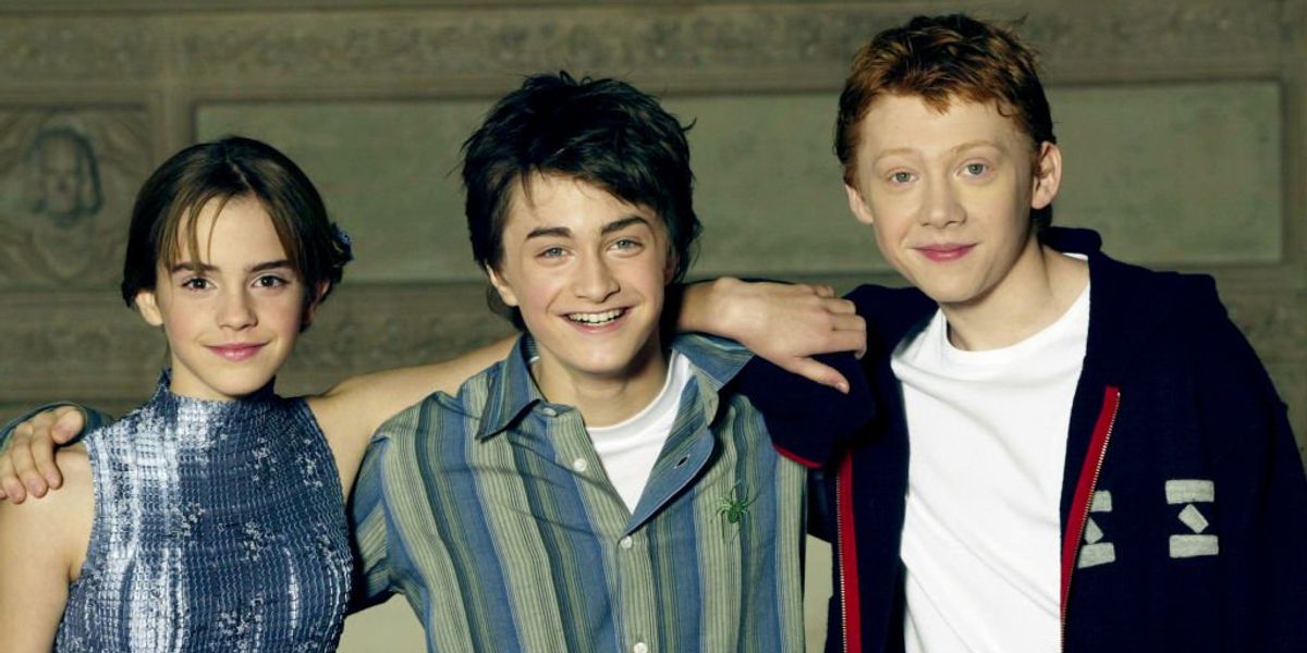 Emma Watson, Daniel Radcliffe és Rupert Grint a Harry Potter és a titkok kamrája című film fotózásán a londoni Guildhallban 2002. október 25-én