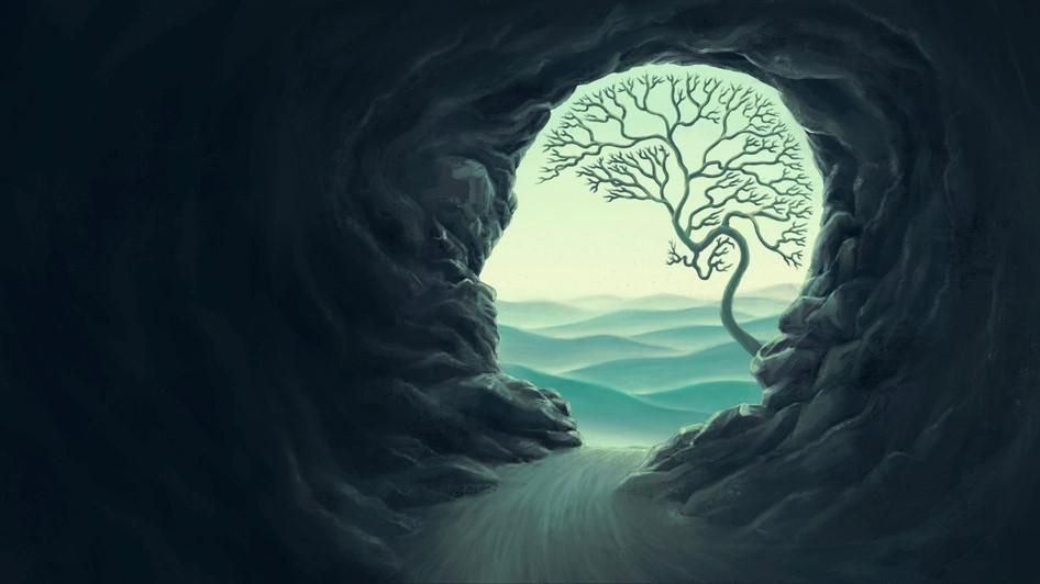 Egy emberi fejnek kinéző barlangnyílás, melyben egy fa illusztrálja az agyat
