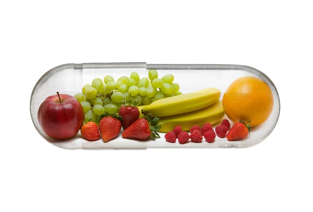 Különböző gyümölcsök kapszulában - egészséges táplálkozás